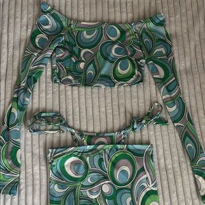two-piece set with attached strings on the bottom piece sold together.